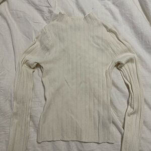 White mock-neck long sleeve shirt